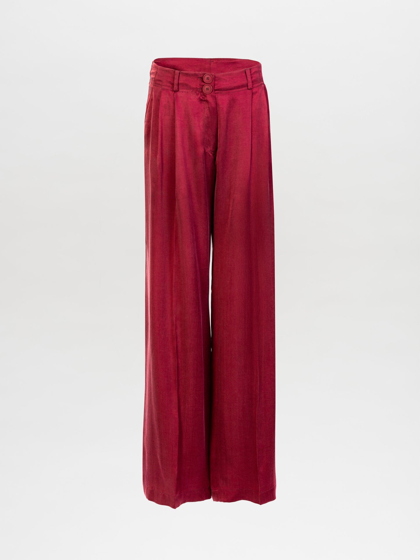 The Opal Pant is a high-waisted, wide-leg red trouser made from premium Italian fabric with front pleats, belt loops, and a double-button closure, shown on a plain white background.