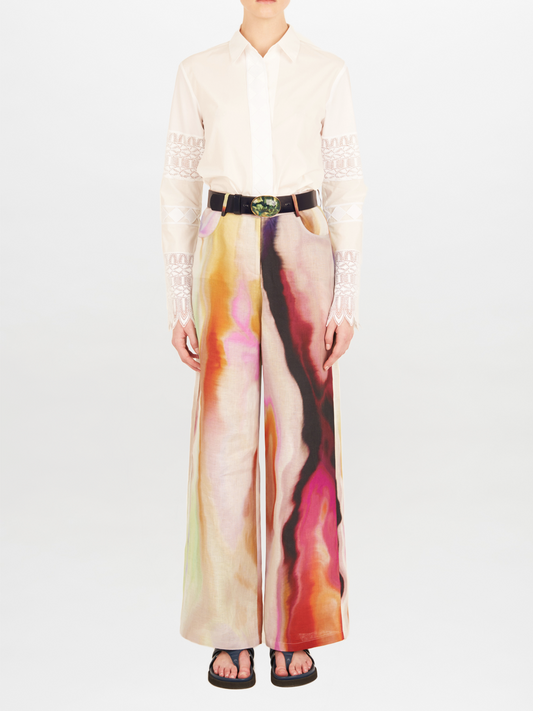 A Aspasia Blouse White with guipure lace detailing on the sleeves.