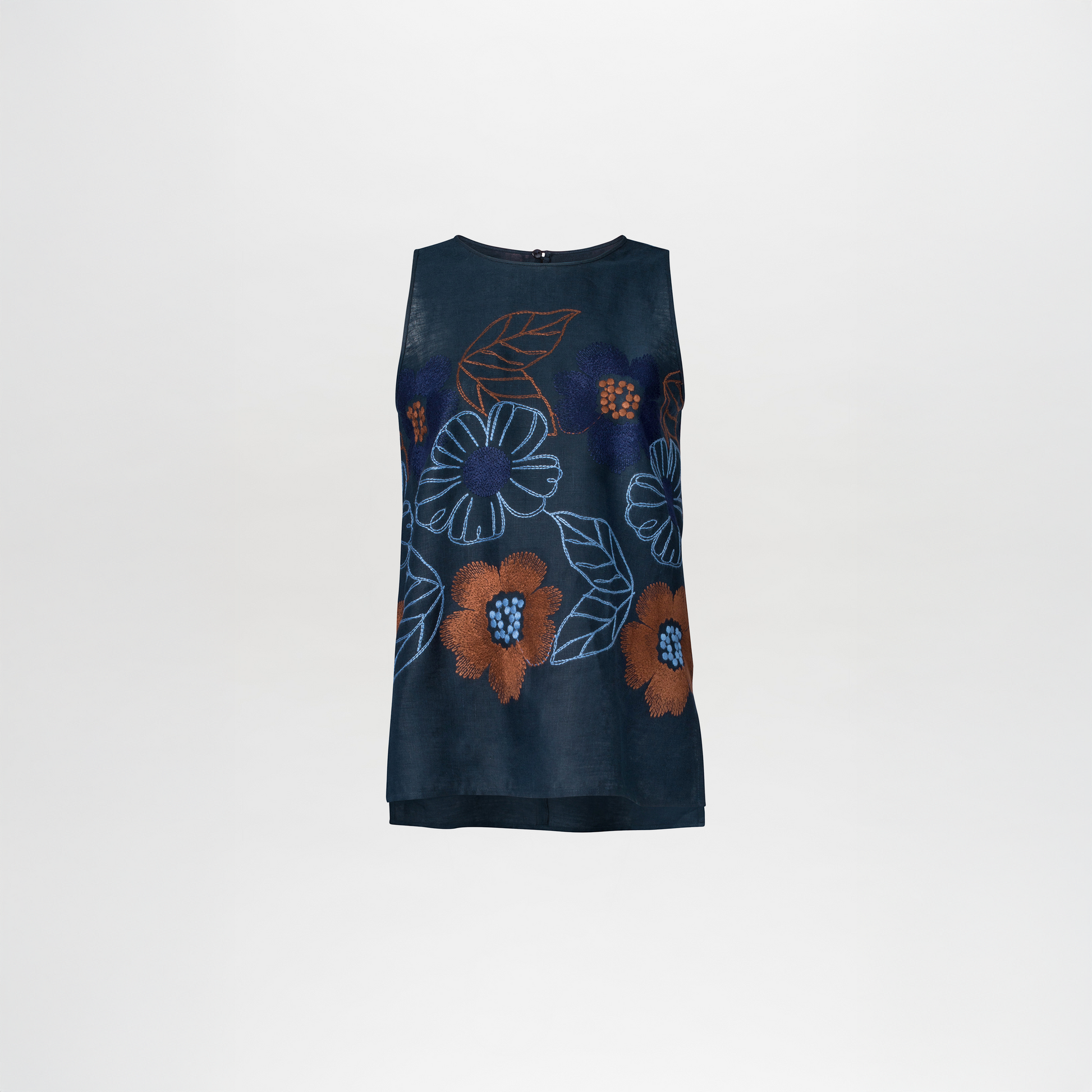 The Leonora Blouse, a sleeveless navy top, features intricate floral embroidery with vibrant orange and blue flowers and leaves on breathable linen.